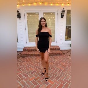 Black Mini Dress Size Medium. Worn once. Strapless with small slit.